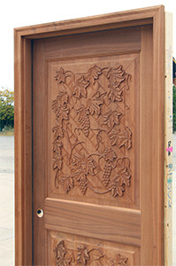 exterior carved wine cellar door