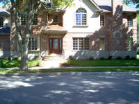 large house with wood front door
