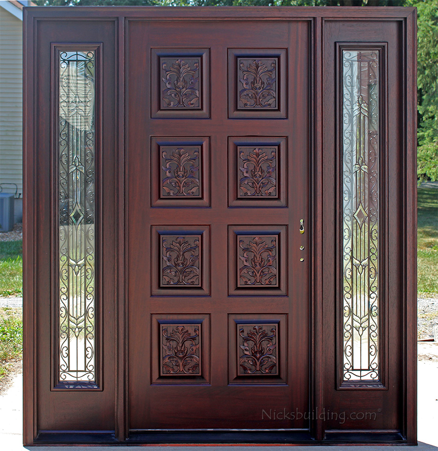 Exterior Hand Carved Doors with Wrought Iron Sidelights