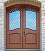 arched top exterior double doors with glass