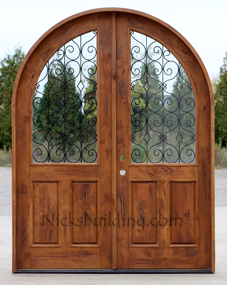Double Doors with Arched Top and wrought iron