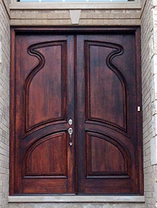 exterior carved double doors application closeup