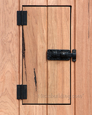 rustic teak door speakeasy