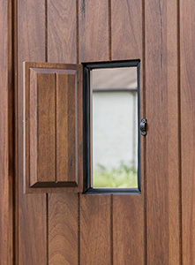 teak door with speakeasy door open