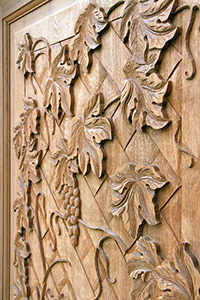 exterior door with hand carvings wine cellar