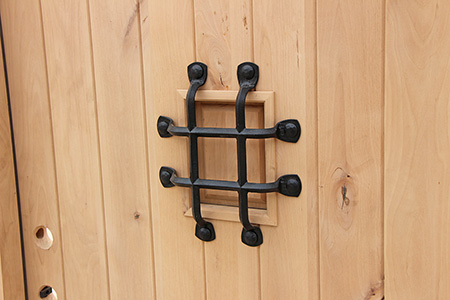 wrought iron grill on speakeasy