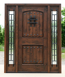exterior entry door in Walnut Finish with Flemish Glass