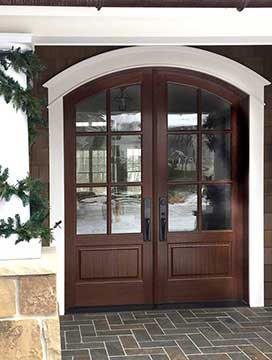 Exterior arched double doors from the Whitehawk collection