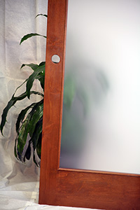 frosted glass mahogany interior door closeup view