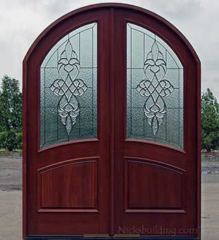 arched top double doors with leaded glass