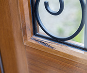 Rustic Teak Doors with Knotty Details